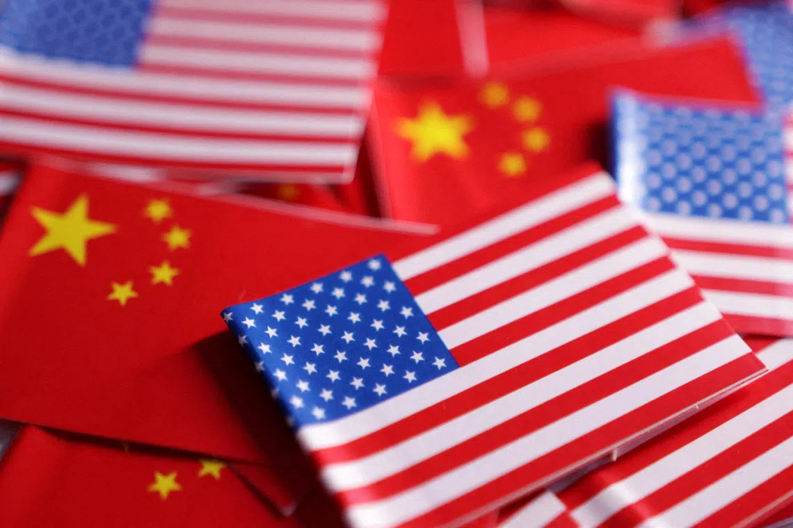 FILE PHOTO: U.S. and Chinese flags are seen in this illustration created on March 20, 2025. REUTERS/Dado Ruvic/Illustration/File Photo
