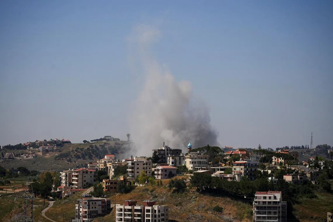 Lebanon says Israeli strikes on south kill 14 as a