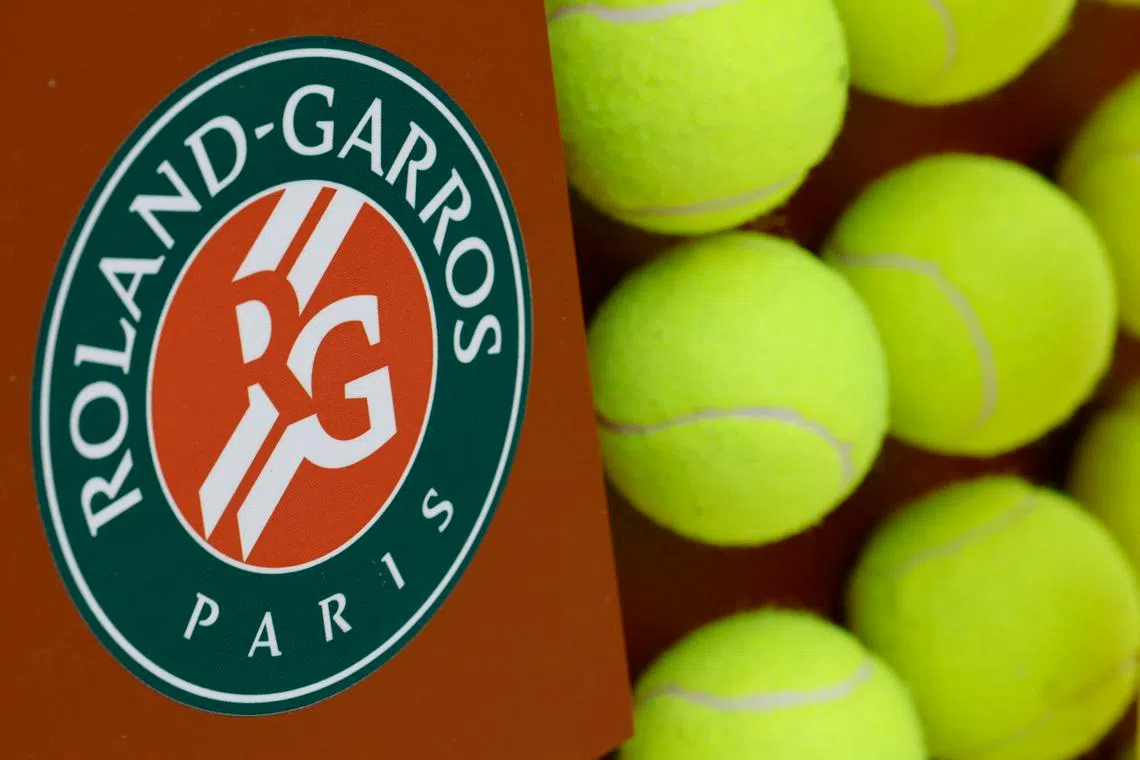 Tennis - French Open - Roland Garros, Paris, France - May 28, 2025 General view of the Roland Garros logo and tennis balls during the second round REUTERS/Stephanie Lecocq