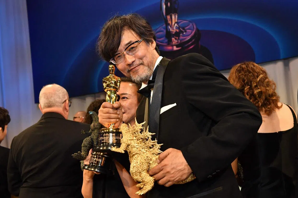 Japanese film director Takashi Yamazaki holds his Oscar for Best Visual Effects as he attends the 96th Annual Academy Awards Governors Ball at the Dolby Theatre in Hollywood, California on March 10, 2024. (Photo by Valerie Macon / AFP)