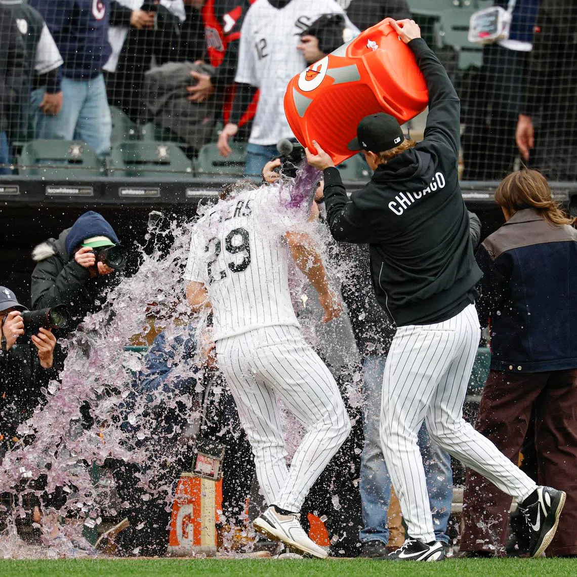 Chicago White Sox right fielder Tristan Peters being doused with Gatorade to celebrate his walk-off RBI single against the Toronto Blue Jays on April 3.