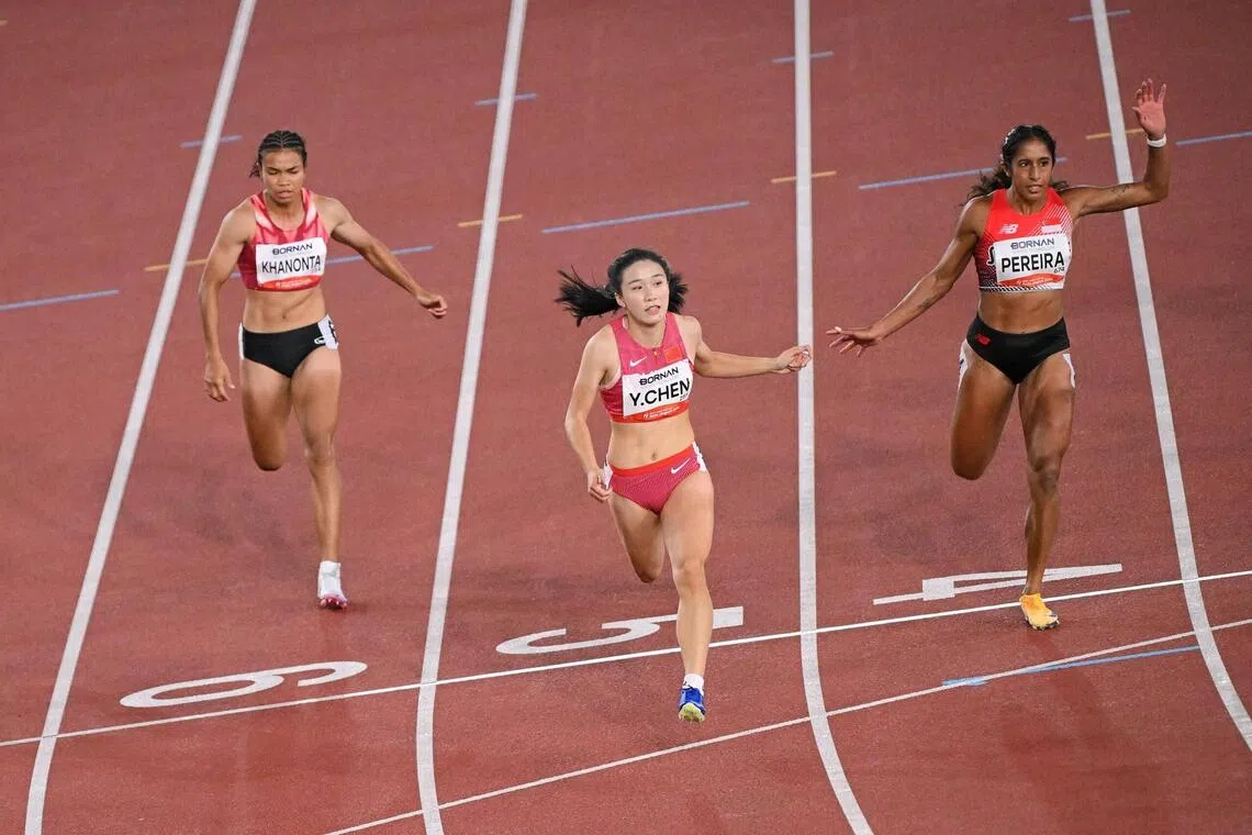 Chen Yujie (centre) pips Singapore’s Shanti Pereira (right) to the gold medal at the Asian Games on Sept 25.