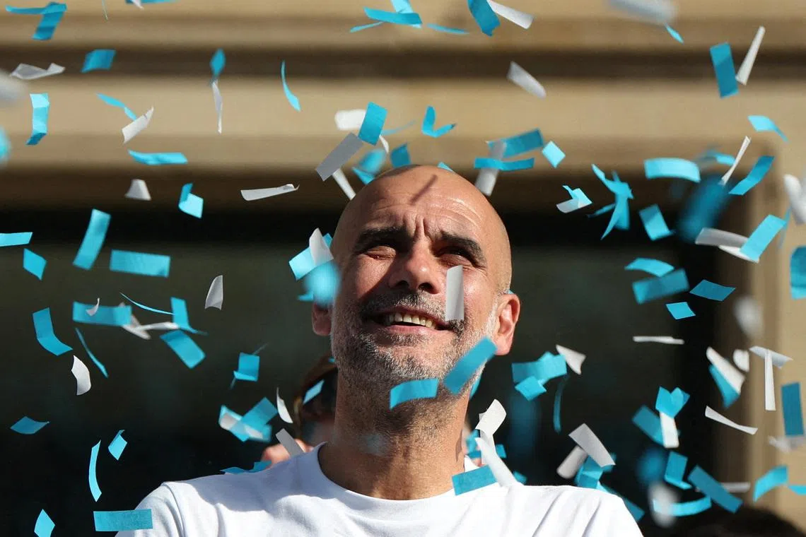 Soccer Football - Manchester City FA Cup and Carabao Cup Victory Parade - Manchester, Britain - May 25, 2026 Manchester City manager Pep Guardiola during the victory parade REUTERS/Scott Heppell
