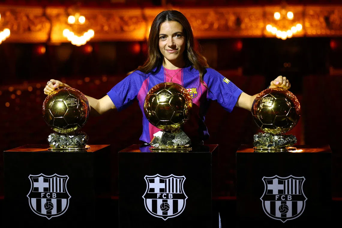 Soccer Football - FC Barcelona celebrate Aitana Bonmati winning her third Ballon d'Or - Liceu Theater, Barcelona, Spain - September 25, 2025 FC Barcelona's Aitana Bonmati poses with her three Ballon d'Or trophies REUTERS/Albert Gea