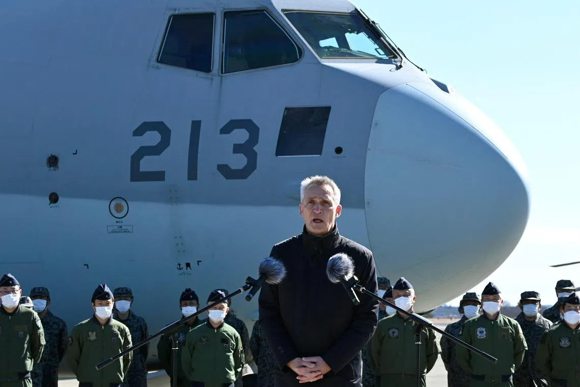 Nato Secretary-General Jens Stoltenberg delivers a speech as he visits Iruma Air Base in Sayama, Saitama Prefecture.