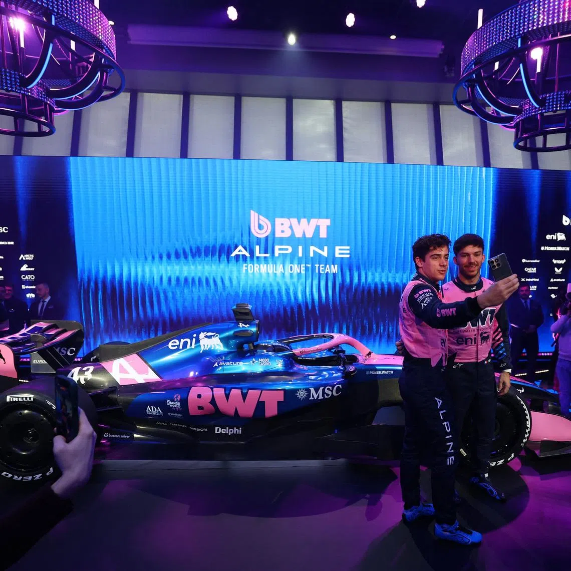 Formula One F1 - Alpine F1 Car Presentation - Barcelona, Spain - January 23, 2026 Drivers Pierre Gasly and Franco Colapinto take a selfie with the new Alpine F1 car during the presentation REUTERS/Albert Gea