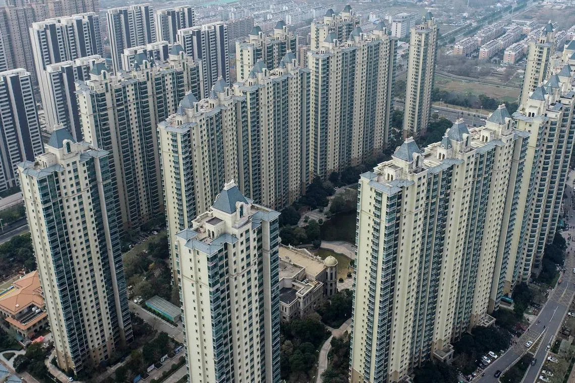 This aerial photo taken on December 3, 2022 shows a housing complex by Chinese property developer Evergrande in Huaian, in China's eastern Jiangsu province. (Photo by AFP) / China OUT