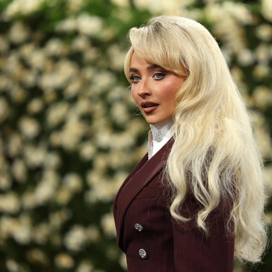 Sabrina Carpenter, seen here at the Met Gala,  gets cheeky in new single Manchild.