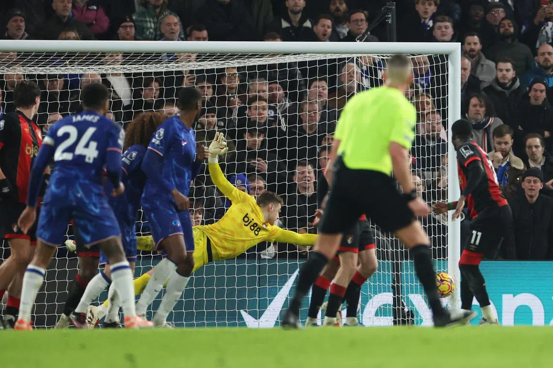Soccer Football - Premier League - Chelsea v AFC Bournemouth - Stamford Bridge, London, Britain - January 14, 2025 Chelsea's Reece James scores their second goal past AFC Bournemouth's Mark Travers from a free kick REUTERS/Isabel Infantes