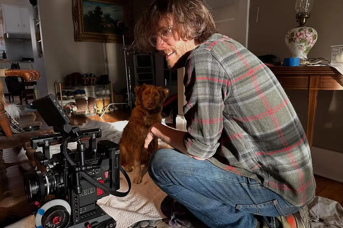 American film-maker Ben Leonberg and Indy, the star of horror movie Good Boy.