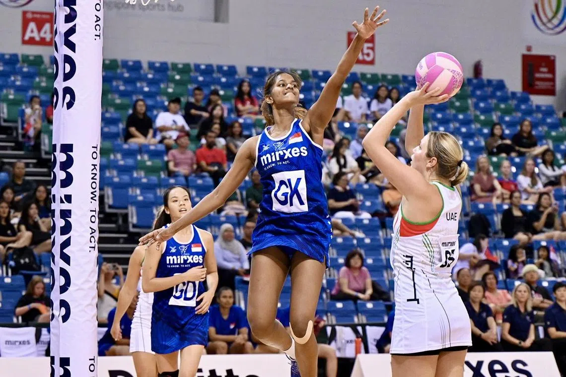 Singapore goal keeper K. Mishalenee attempts to block off UAE's goal shooter Charlie Preston.

Singapore beat the United Arab Emirates 68-47
during the Mirxes Nations Cup group game on 5 September 2024.