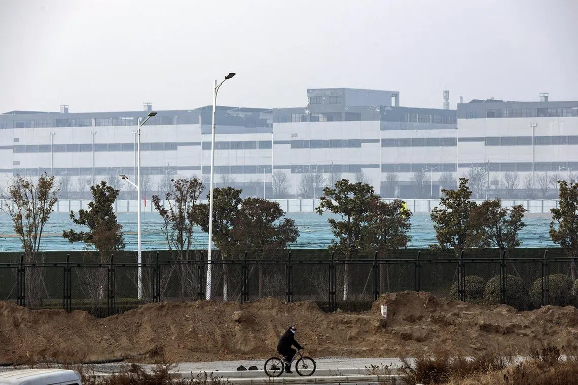 A Foxconn Technology Group plant in Zhengzhou, Henan province, China, on Thursday, Jan. 6, 2023. Foxconn has brought the world's largest iPhone plant to about 90% of anticipated peak capacity, suggesting Apple Inc.’s biggest main production partner has secured enough workers despite a Covid resurgence and recent staff upheaval. Photographer: Qilai Shen/Bloomberg