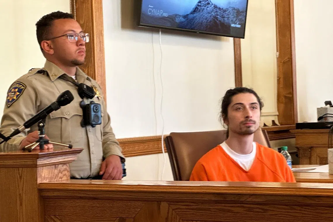 FILE PHOTO: Ryan Martinez, charged with attempted murder for the alleged shooting of Native American climate activist Jacob Johns at a protest against the installation of a statue of a Spanish conquistador, appears at a court hearing at Rio Arriba County Courthouse in Tierra Amarilla, New Mexico, U.S., October 13, 2023. REUTERS/Andrew Hay/File Photo