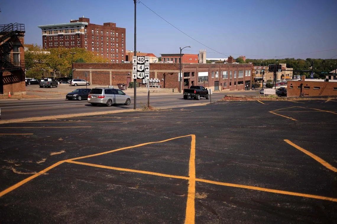 SPRINGFIELD, OHIO - SEPTEMBER 16: Motorists drive down Spring Street on September 16, 2024 in Springfield, Ohio. Springfield, home to a large Haitian community, was thrust into the national spotlight after former President Donald Trump made claims during the presidential debate against Vice President Kamala Harris, accusing members of the immigrant community of eating the pets of local residents. The claims, which have since been called into question, have been circulating online and in the news media, and in the days following the debate local institutions have faced multiple bomb threats.   Luke Sharrett/Getty Images/AFP (Photo by LUKE SHARRETT / GETTY IMAGES NORTH AMERICA / Getty Images via AFP)