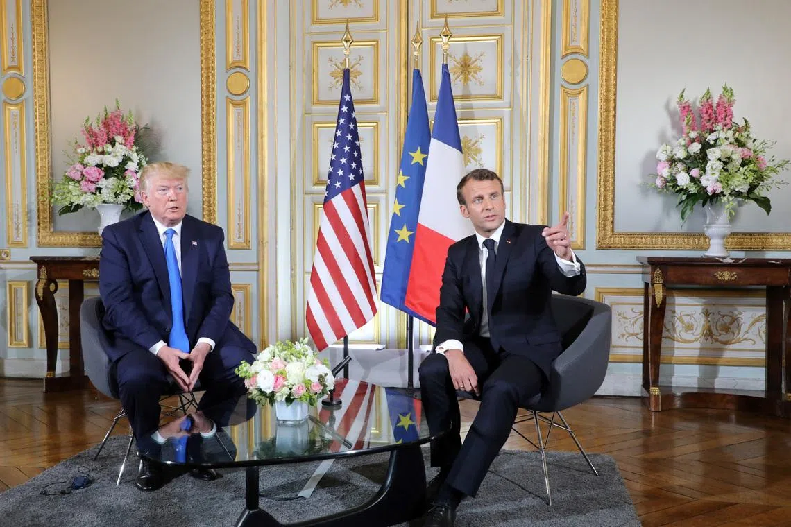 Trump shares messages from France's Macron offering G7 meeting after Davos