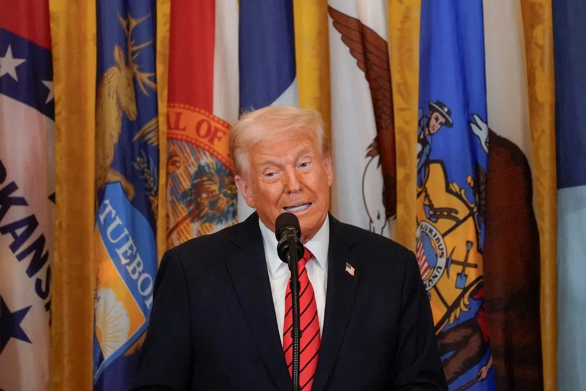 FILE PHOTO: U.S. President Donald Trump speaks during an event to sign an executive order to shut down the Department of Education, in the East Room at the White House in Washington, D.C., U.S., March 20, 2025. REUTERS/Nathan Howard/File Photo