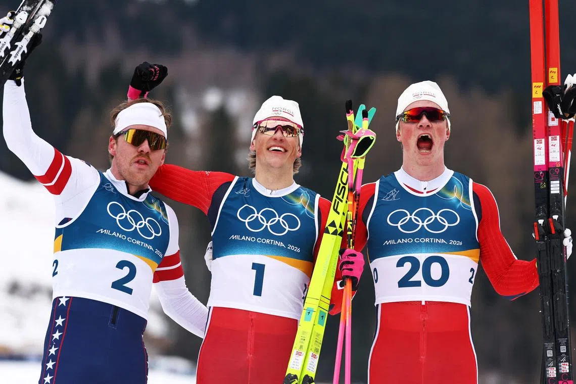 Milano Cortina 2026 Olympics - Cross-Country Skiing - Men's Sprint Classic Final - Tesero Cross-Country Skiing Stadium, Lago, Italy - February 10, 2026. Johannes Hoesflot Klaebo of Norway celebrates after winning the Men's Sprint Classic Final with second placed Ben Ogden of United States and third placed Oskar Opstad Vike of Norway REUTERS/Kai Pfaffenbach