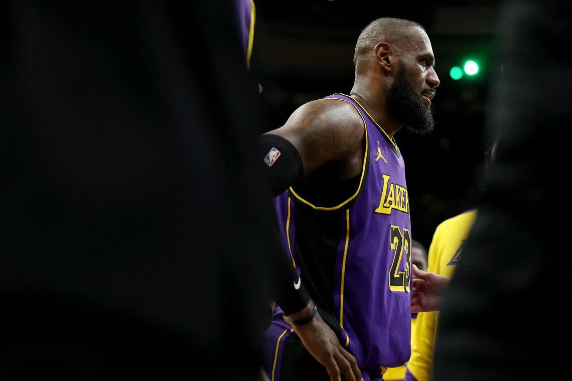  LeBron James #23 of the Los Angeles Lakers leaves the game after an injury on March 8.