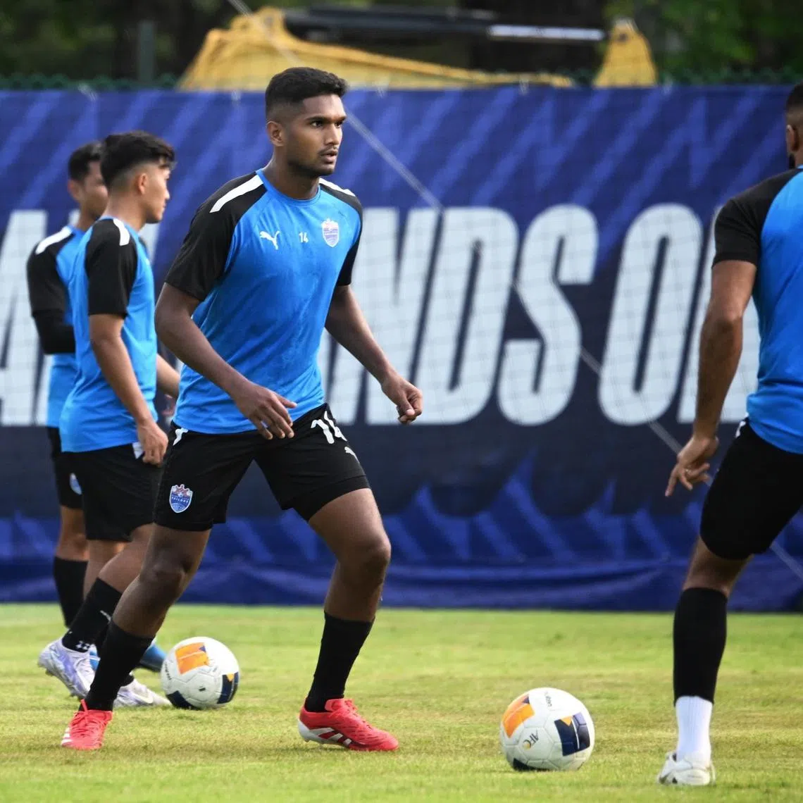 Lion City Sailors footballer Hariss Harun (left) in training at the Lion City Sailors Training Centre on May 17, 2025.
