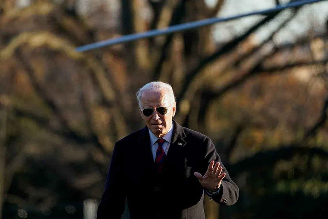U.S. President Joe Biden walks from Marine One as he returns to the White House in Washington, U.S., December 11, 2023. REUTERS/Elizabeth Frantz