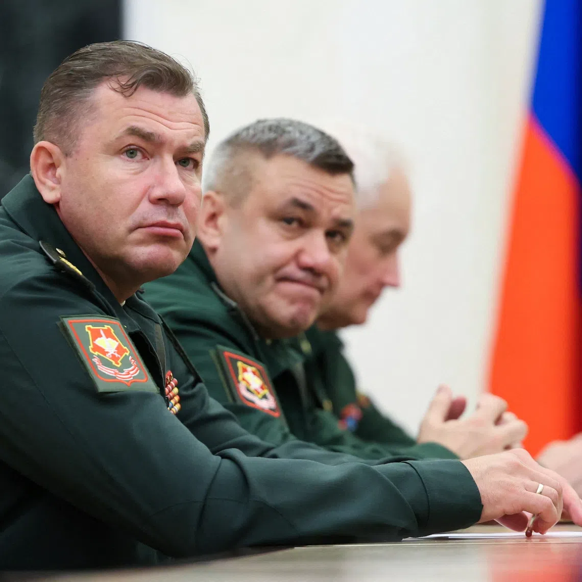 Denis Lyamin, newly appointed head of Russia's Unmanned Systems Forces, Valery Solodchuk, newly appointed head of the Logistics Service, and Defence Minister Andrei Belousov attend a meeting of Russian President Vladimir Putin with the leadership of the Defence Ministry, at the Kremlin in Moscow, Russia August 5, 2026. Sputnik/Alexander Kazakov/Pool via REUTERS