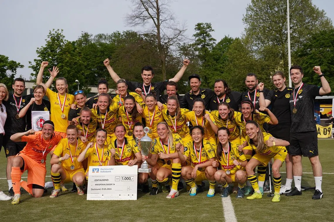 dlsoc02 - The Borussia Dortmund women's team celebrating their Kreispokal final win over SpVg Berghofen

Credit: Aleks Czapla