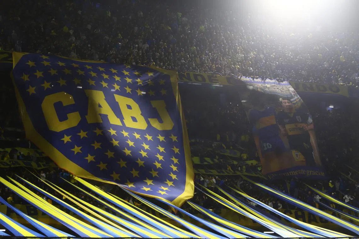 FILE PHOTO: Soccer Football - Copa Libertadores - Group F - Boca Juniors v Deportivo Pereira - La Bombonera, Buenos Aires, Argentina - April 18, 2023 General view as Boca Juniors fans display banners inside the stadium before the match REUTERS/Matias Baglietto/File Photo
