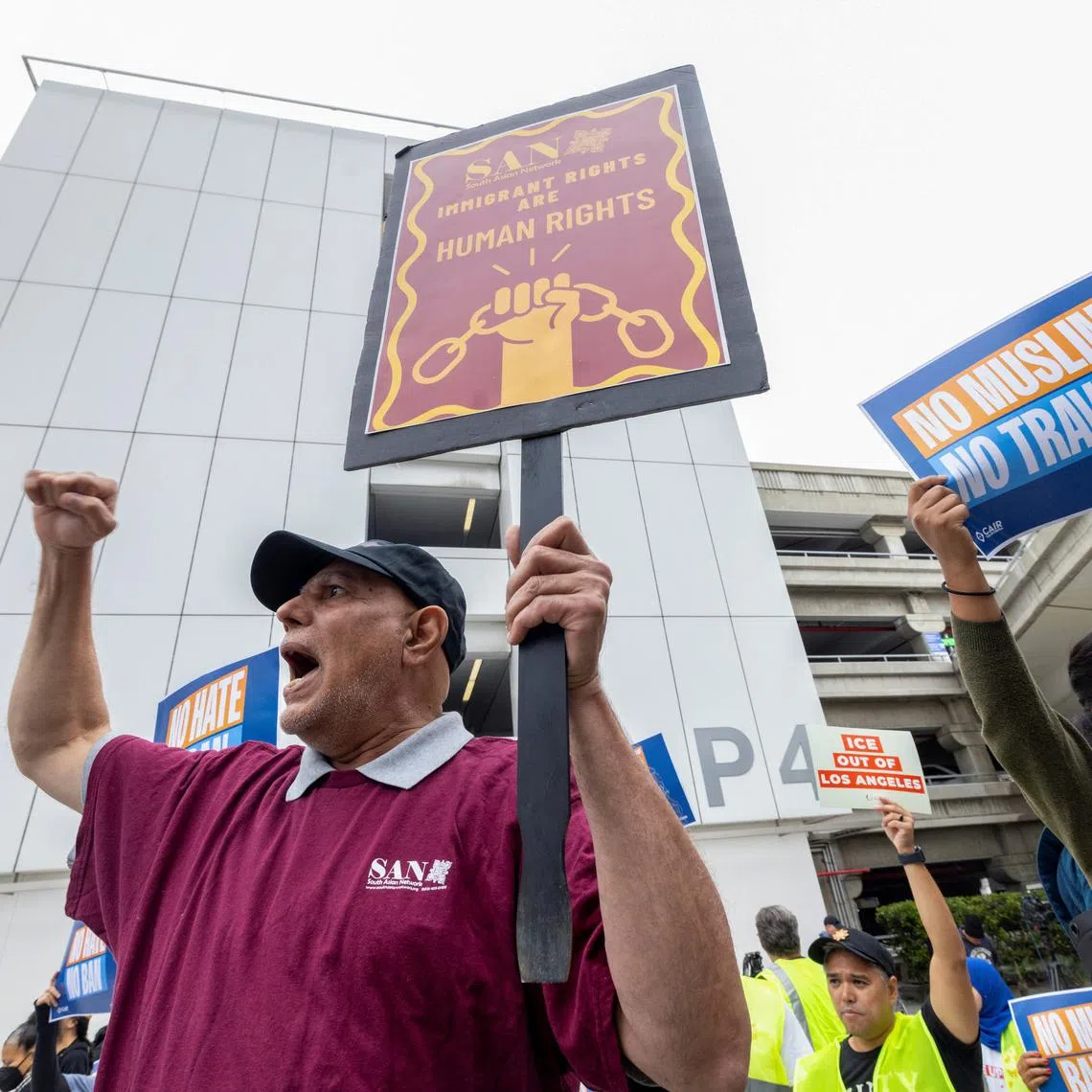 People take part in a protest sponsored by the Council on American Islamic Relations (CAIR) against U.S. President Donald Trump's new sweeping travel ban, which went into effect as his administration intensifies its immigration crackdown, at Los Angeles International Airport (LAX) in  Los Angeles, California, U.S., June 9, 2025.   REUTERS/Jill Connelly