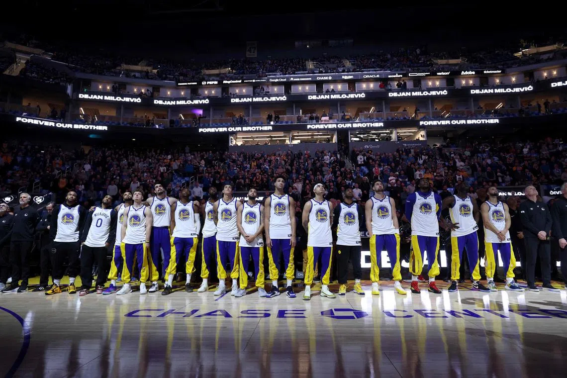 The Golden State Warriors honour their late assistant coach Dejan Milojevic during a ceremony before their game against the Atlanta Hawks on Jan 24.