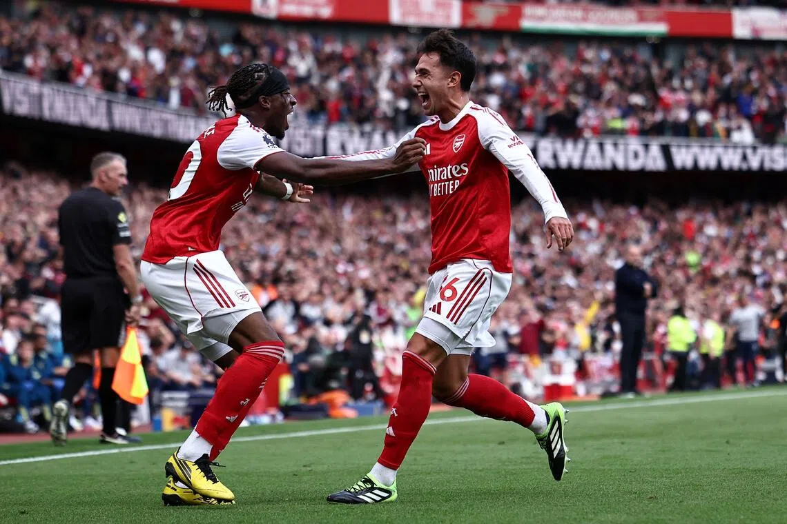 Arsenal's Martin Zubimendi (right) celebrating with Noni Madueke after scoring their first goal in the 3-0 win over Nottingham Forest on Sept 13.