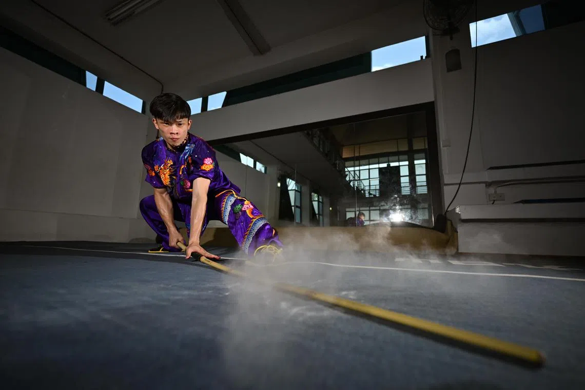 ST20240322-202432784683-Lim Yaohui-David Lee-dljowen/
ST Athlete of the Year nominee, featuring wushu world champion Jowen Lim, 25, with his cudgel, at Singapore Wushu Dragon & Lion Dance Federation on Mar 22, 2024.
(ST PHOTO: LIM YAOHUI)