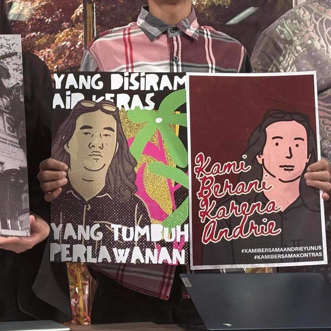 Activists from the Advocacy Team for Democracy hold up posters in support of Mr Andrie Yunus at a press conference in Central Jakarta on Mar 16.