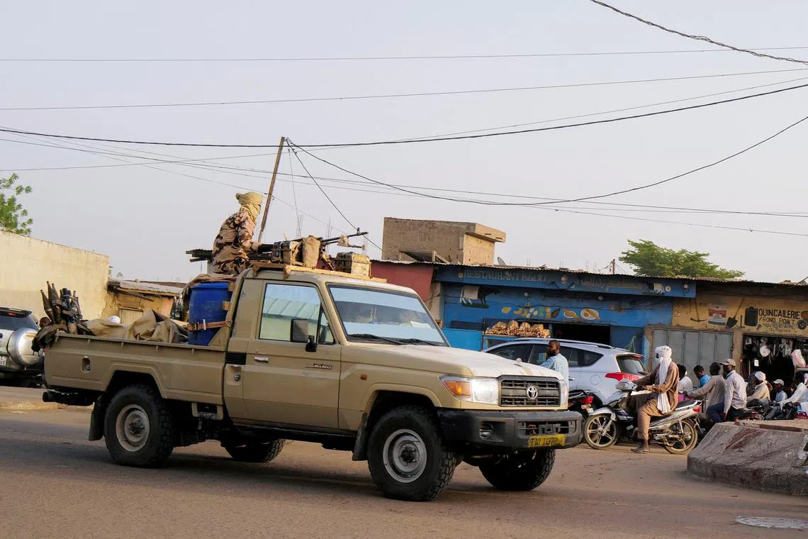 FILE PHOTO: Members of the security forces patrol Chad's capital N'Djamena following the battlefield death of President Idriss Deby in N'Djamena, Chad April 26, 2021. REUTERS/Zohra Bensemra/File Photo