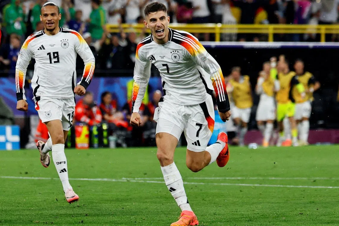 Germany's Kai Havertz celebrates scoring their first goal with Leroy Sane, Soccer Football, Euro 2024, Round of 16, Germany v Denmark, Dortmund BVB Stadion, Dortmund, Germany, June 29, 2024. REUTERS/Wolfgang Rattay/File Photo