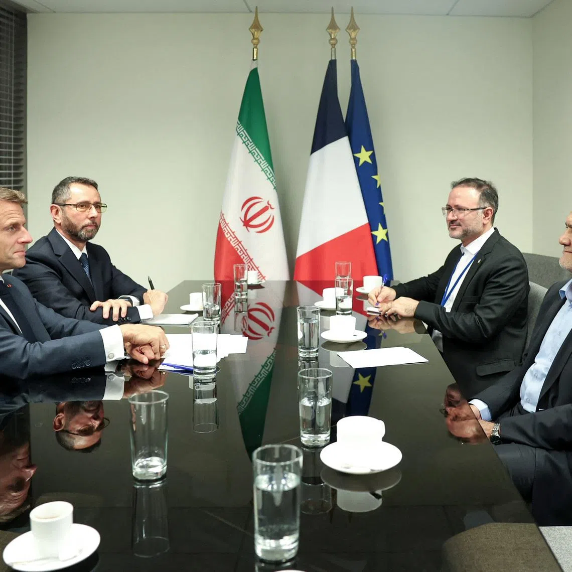 Iran's President Masoud Pezeshkian meets with France's President Emmanuel Macron in New York City, U.S., September 24, 2024. Iran's Presidency/WANA (West Asia News Agency)/Handout via REUTERS