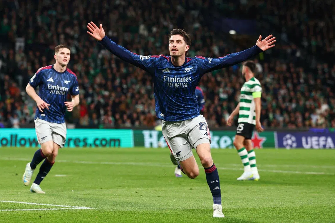 Soccer Football - UEFA Champions League - Quarter Final - First Leg - Sporting CP v Arsenal - Estadio Jose Alvalade, Lisbon, Portugal - April 7, 2026 Arsenal's Kai Havertz celebrates scoring their first goal REUTERS/Pedro Nunes