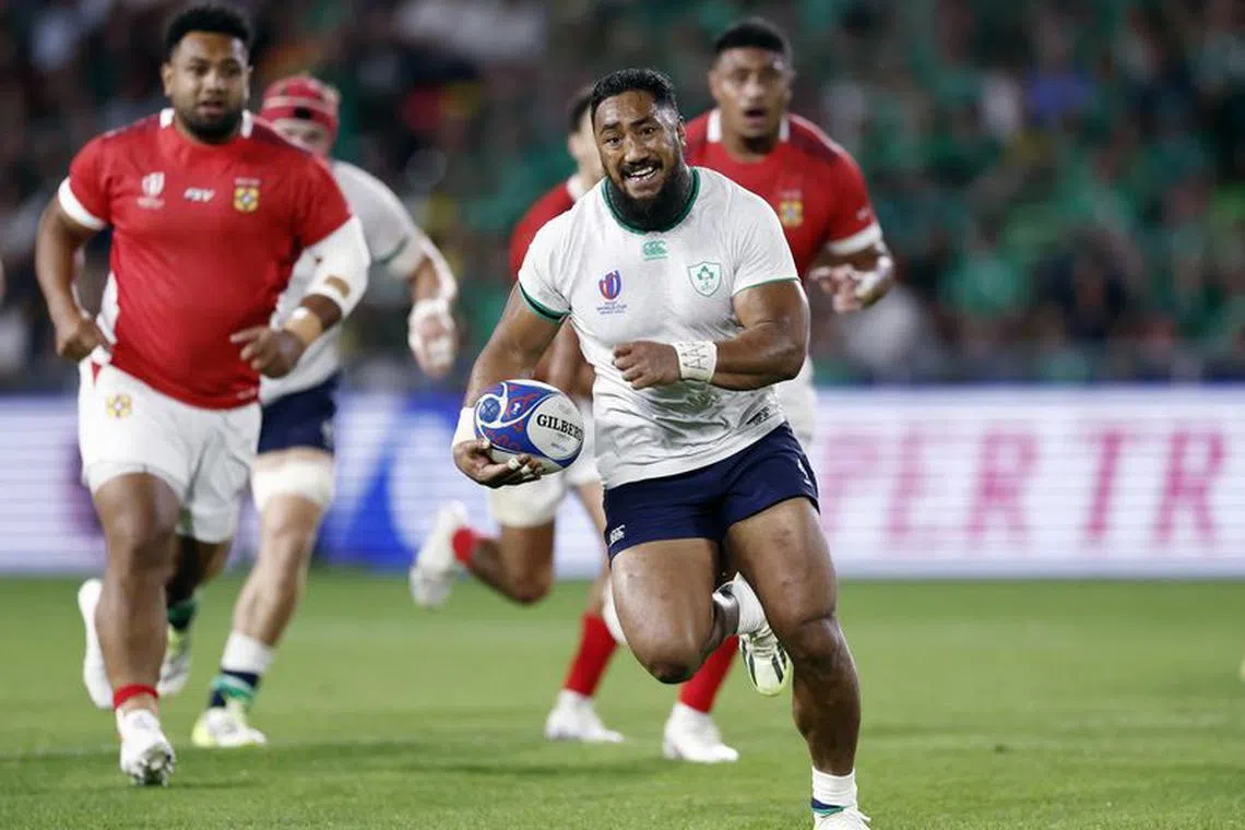 Rugby Union - Rugby World Cup 2023 - Pool B - Ireland v Tonga - The Stade de la Beaujoire - Louis Fonteneau, Nantes, France - September 16, 2023  Ireland's Bundee Aki on his way to score their sixth try REUTERS/Benoit Tessier