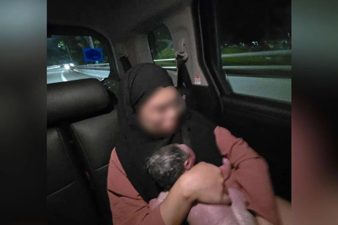 Madam Afifah Rizqin's newborn was neither crying nor moving when she was born in the backseat of a Grab car.
