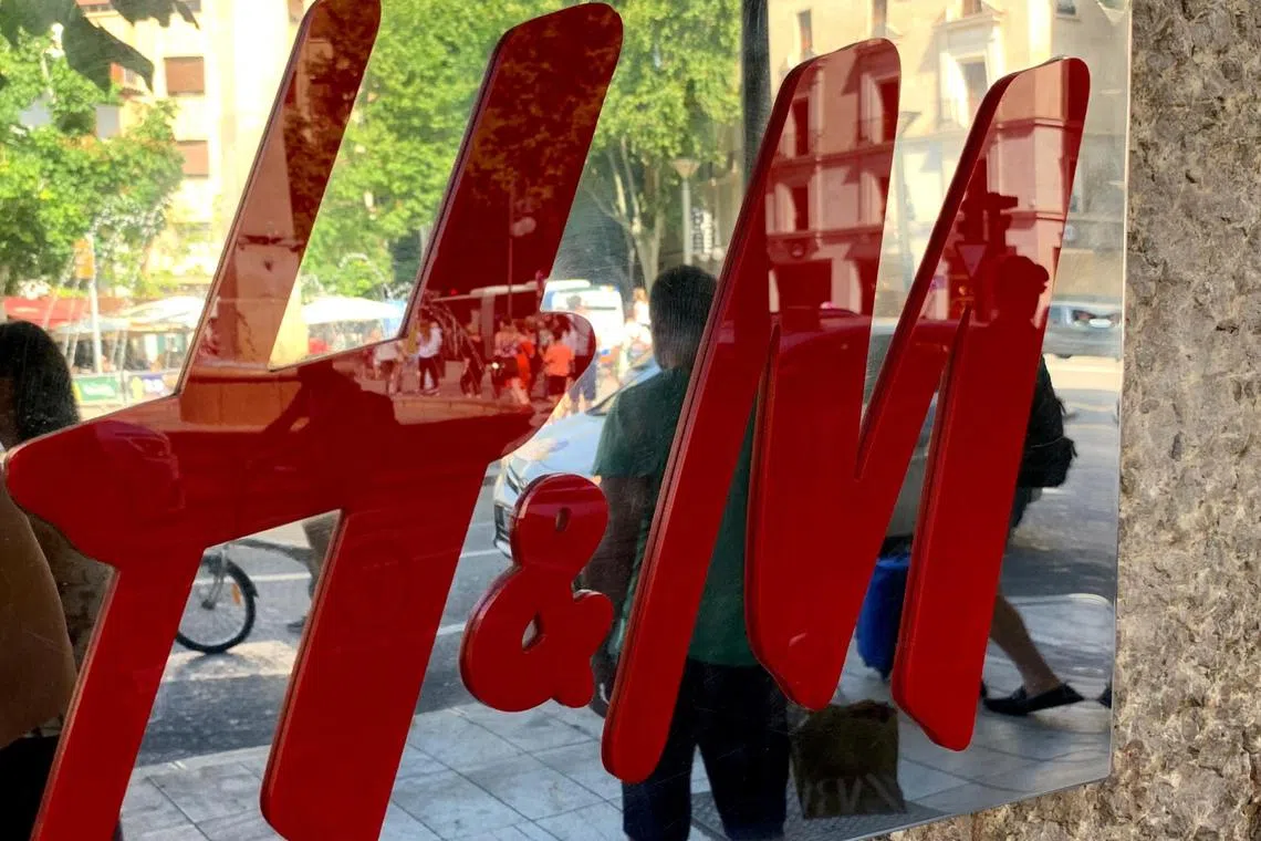 An H&M sign is seen at the entrance to an H&M store in Palma on the island of Mallorca, Spain June 14, 2019. Picture taken June 14, 2019.
