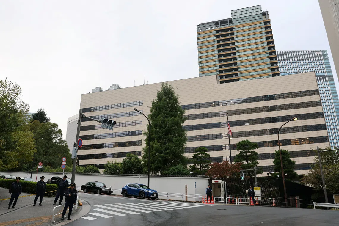 The man pointed a kitchen knife at anti-riot police officers on the street in front of the US embassy in Tokyo.
