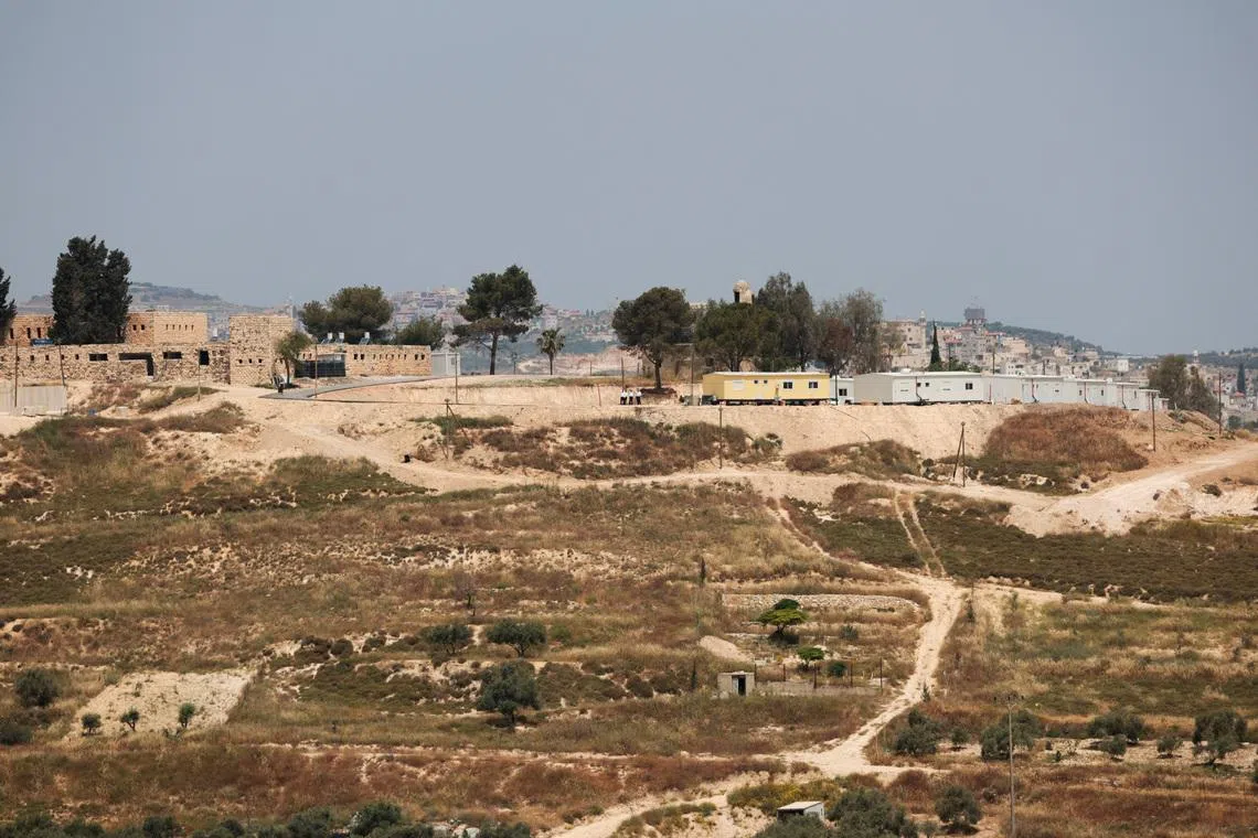 Israeli settlement structuers being installed in Sanur near Jenin, in the Israeli-occupied West Bank, May 9, 2026. REUTERS/Mohamad Torokman
