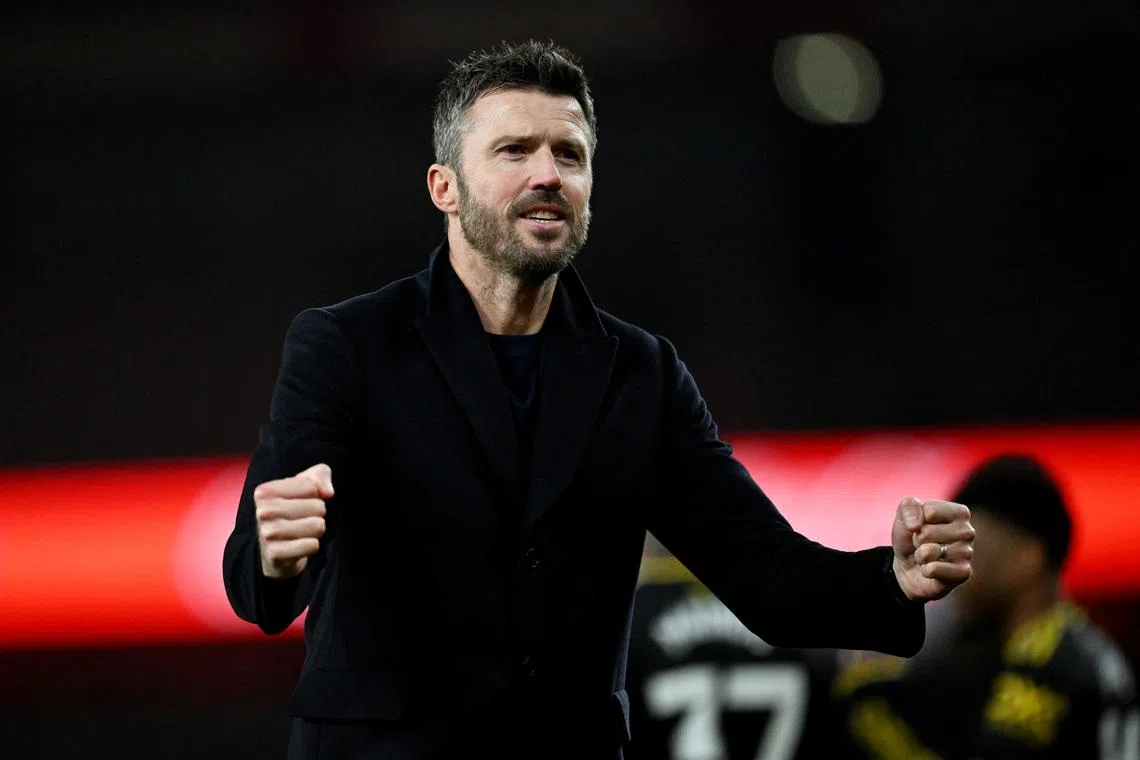 Soccer Football - Premier League - Arsenal v Manchester United - Emirates Stadium, London, Britain - January 25, 2026 Manchester United manager Michael Carrick celebrates after the match REUTERS/Dylan Martinez