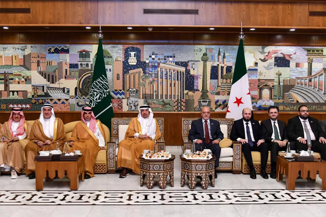 Saudi Arabian Investment Minister Khalid bin Abdulaziz al-Falih (centre left) and his delegation are received at Damascus International Airport by their Syrian counterparts.