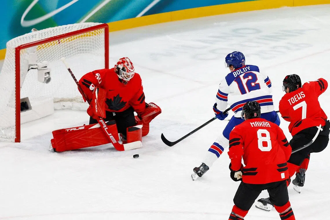 Milano Cortina 2026 Olympics - Ice Hockey - Men's Gold Medal Game - Canada vs United States - Milano Santagiulia Ice Hockey Arena, Milan, Italy - February 22, 2026. Matt Boldy of United States scores their first goal REUTERS/Alessandro Garofalo