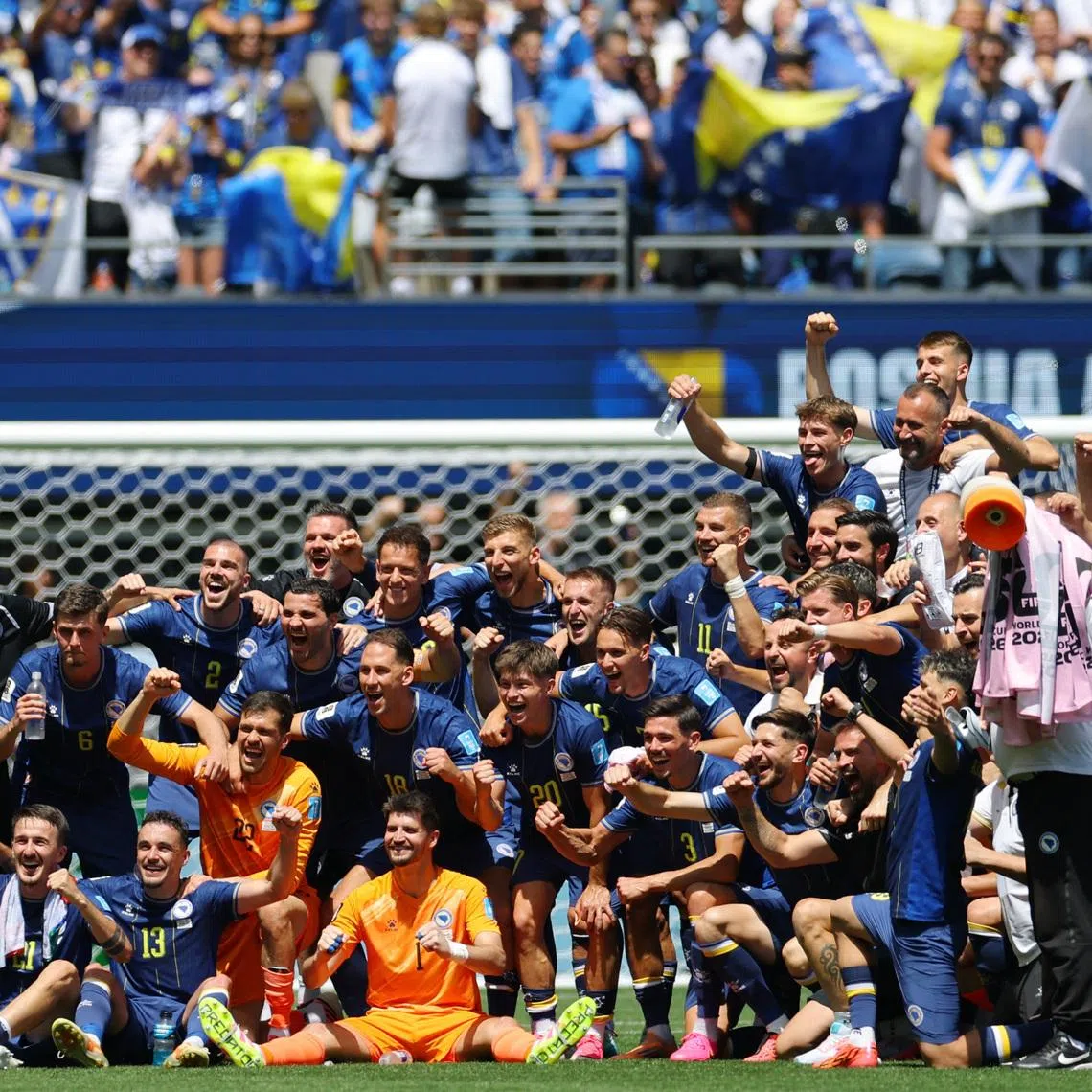 Soccer Football - FIFA World Cup 2026 - Group B - Bosnia and Herzegovina v Qatar - Seattle Stadium, Seattle, Washington, U.S. - June 24, 2026 Bosnia and Herzegovina players celebrate after the match REUTERS/Carlos Barria