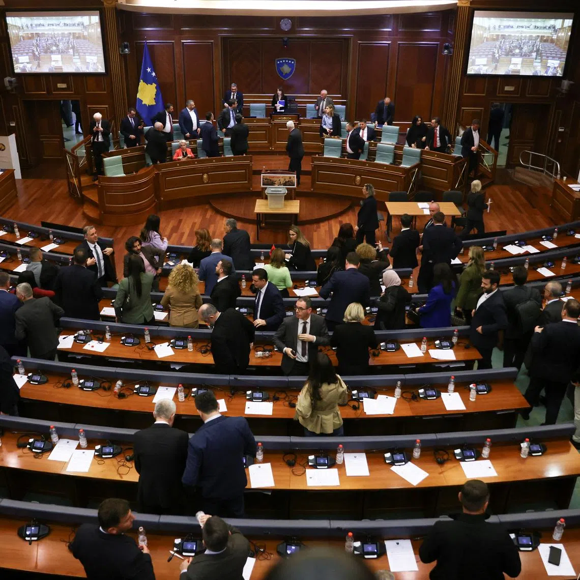Members of parliament leave the plenary session after failing to elect the new president at the parliament building in Pristina, Kosovo, March 5, 2026. REUTERS/Valdrin Xhemaj