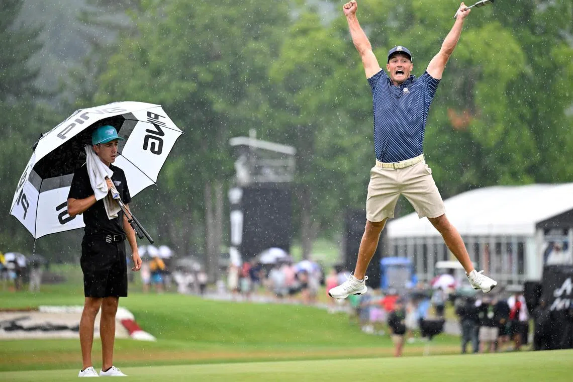Bryson DeChambeau celebrating his birdie putt on the 18th hole with a record 58 to win the LIV Golf Invitational Greenbrier in West Virginia.  