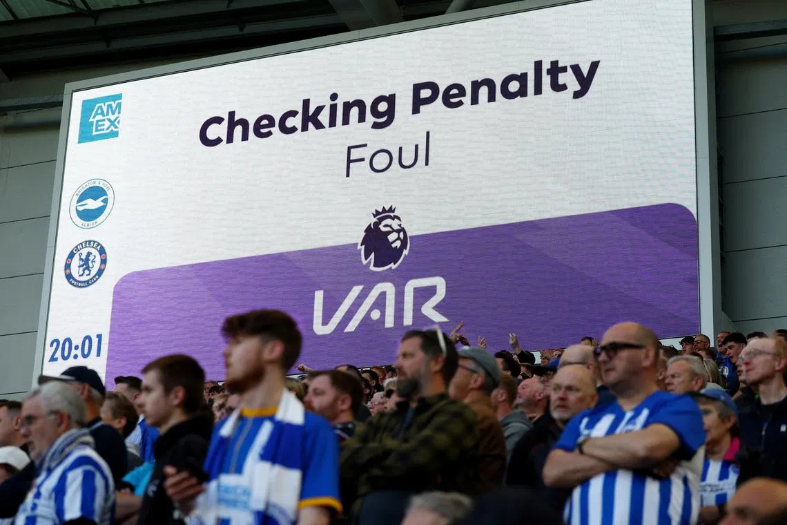 FILE PHOTO: Soccer Football - Premier League - Brighton & Hove Albion v Chelsea - The American Express Community Stadium, Brighton, Britain - May 15, 2024 General view of the big screen during a VAR review before a penalty is overturned Action Images via Reuters/Paul Childs