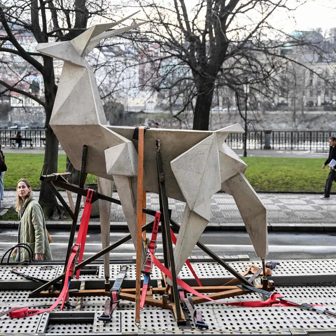 The 'Origami Deer' sculpture by Ukrainian artist Zhanna Kadyrova is on the loading area of a transport vehicle during a stopover in Prague on its way to the Venice Biennale.