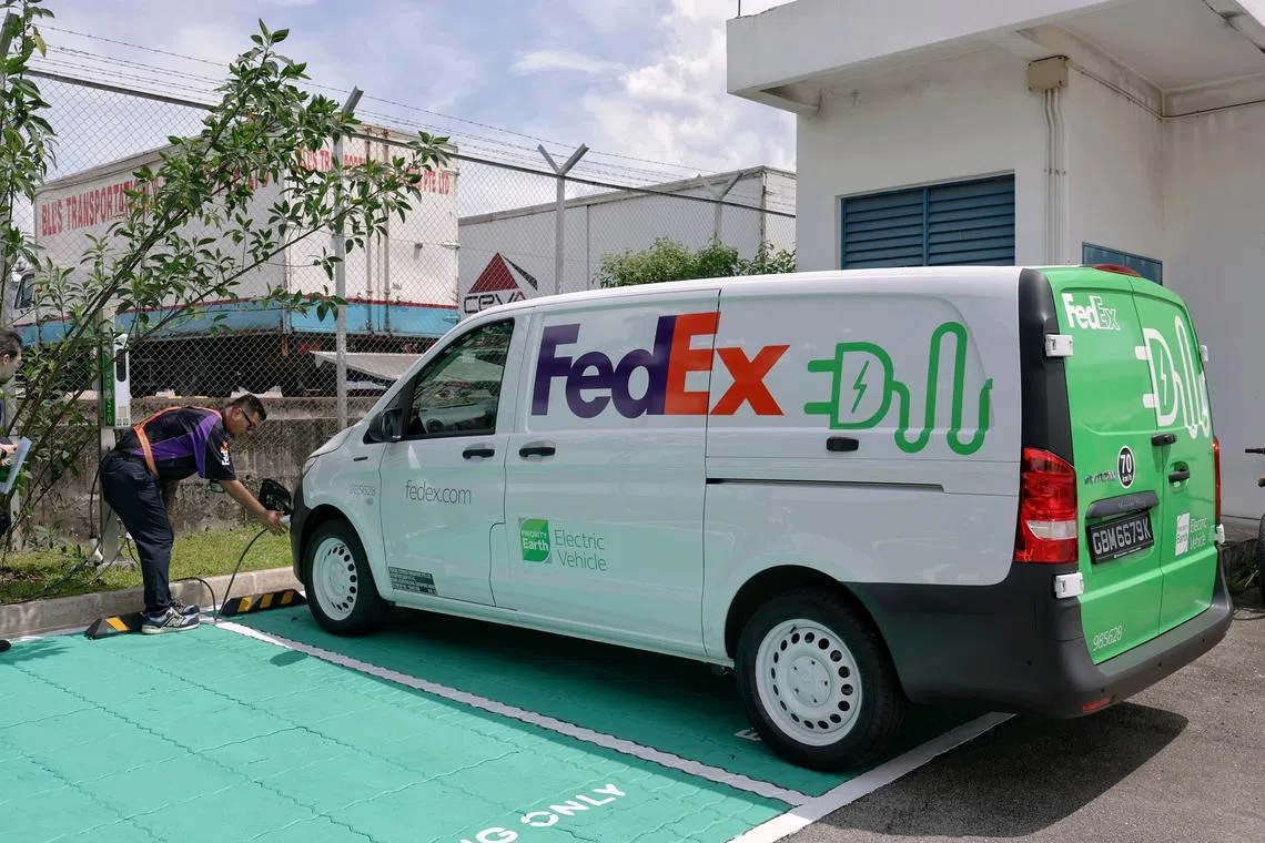 A new EV, part of a fleet launched by FedEx, at the charging station in FedEx's Alps facility on Nov 22, 2024. Singapore is the first market in APAC to receive these new vehicles. ST PHOTO: KEVIN LIM vcfedex22